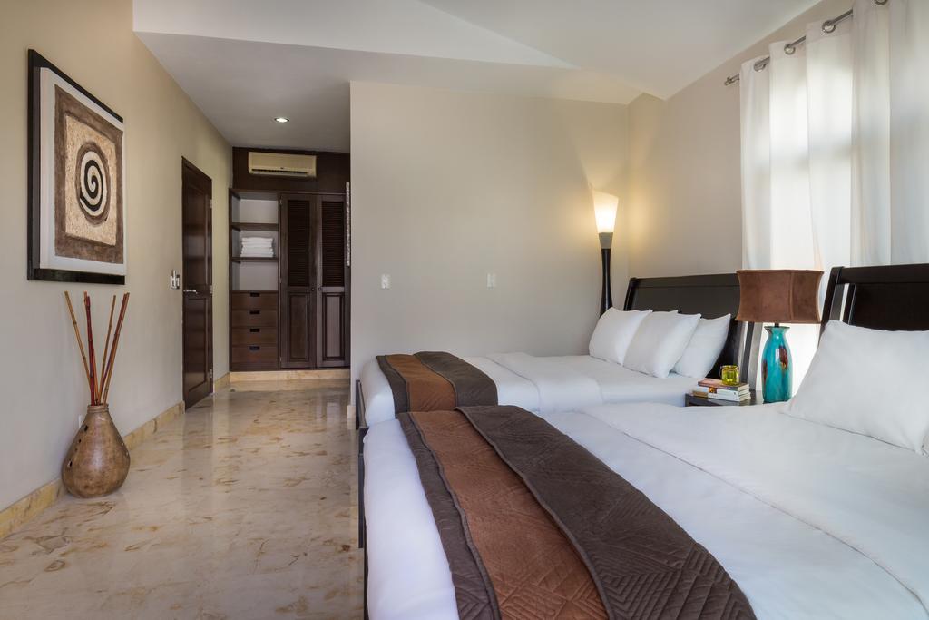 Paseo Luxury Suites Плая-дель-Кармен Номер фото